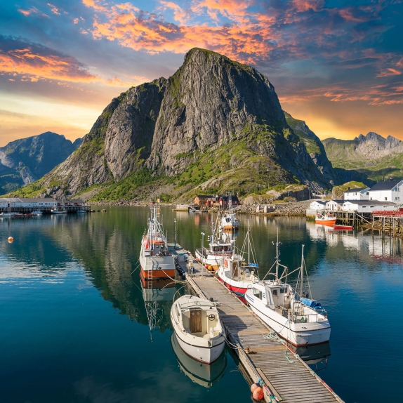 Norway scenic shot of mountain and boats